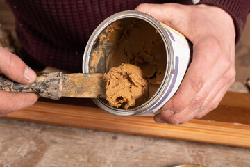 putty and trowel for restoration of wooden furniture and surfaces