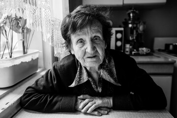 An elderly russian retired woman. Black and white photo.