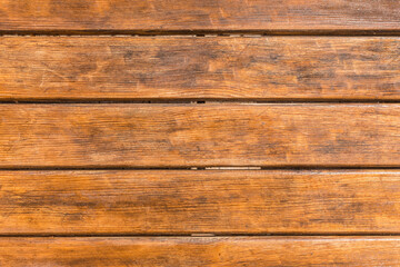 Horizontal old brown planks table texture background, top view