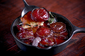 Homemade plum cake taken out of the oven