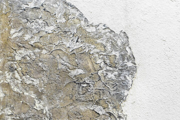 Part of wall of modern interior facade of building with white plaster and abstract patterns texture background