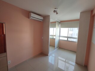 empty apartment with colorful furniture