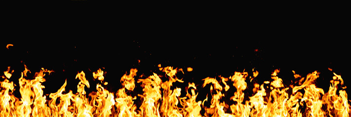 Fire banner. Flame pattern. Wildfire inferno. Bright orange yellow warm fireplace heat with sparks isolated on black night abstract copy space background.
