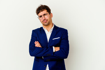 Young business caucasian man isolated on white background unhappy looking in camera with sarcastic expression.