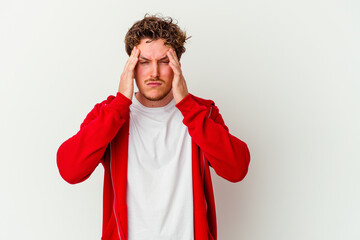 Young caucasian man isolated on white background touching temples and having headache.