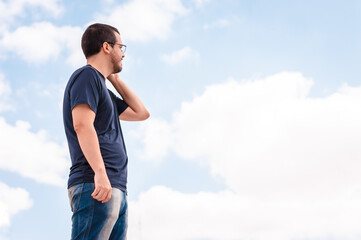 latin man talking on smartphone