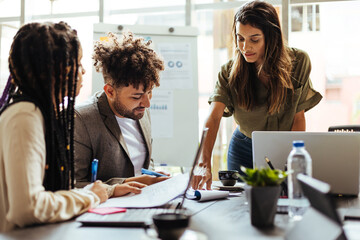 Young business team meeting in the office