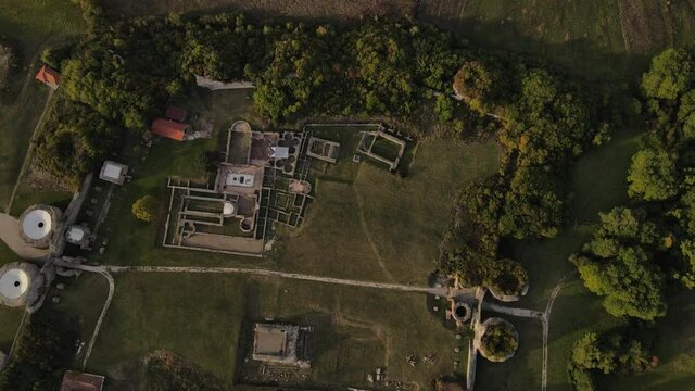 Drone aerial view on Felix Romuliana ancient castle and fortress from roman empire time with walls and buildings remaining located near Zajecar Serbia unedited video