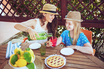 smiling elegant family sitting at table having breakfast
