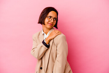Young business mixed race woman isolated on pink background having a shoulder pain.