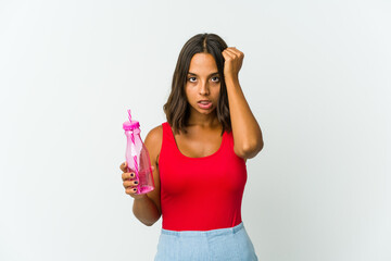 Young latin woman holding a milkshake isolated on white background