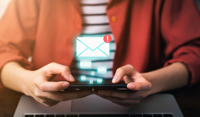 Young woman using smartphone and showing email notification on screen, Concept networking online.