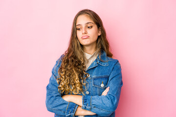 Fototapeta premium Young caucasian woman tired of a repetitive task.