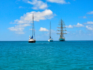 Sailing boats anchored in a paradise bay, St Vincent and the Grenadines, Caribbean lesser Antilles.