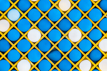 Many blue bright balloons in a diagonal pattern background for playing darts