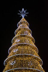 golden christmas tree on black