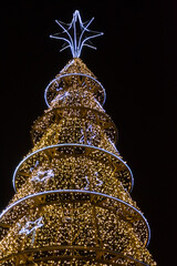 golden christmas tree on black