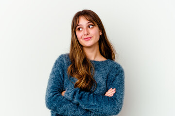 Young caucasian cute woman isolated on white background dreaming of achieving goals and purposes