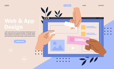 Web design concept with hands placing elements onto a digital device screen