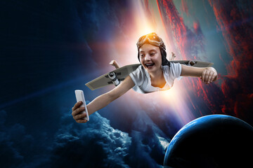 Fototapeta na wymiar Girl flying with self-made plane wing. Mixed media