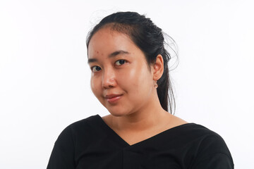 Young Asian woman with no make up on white background.