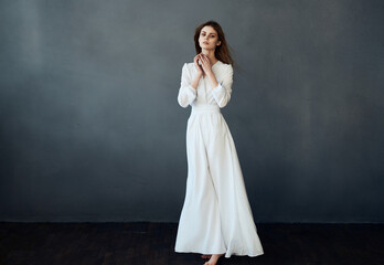 Fototapeta na wymiar Beautiful glamor woman elegant white dress luxury performance