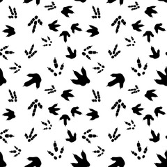 Fototapeta na wymiar Dinosaur footprint tracks. Minimal seamless pattern. Background with paw, claw predator. Dinosaur footprint illustration perfect for textile, wrap and wallpaper and design.