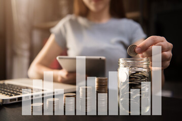 Accountant working on desk in office using tablet to calculate budget. concept finance and accounting in morning light.