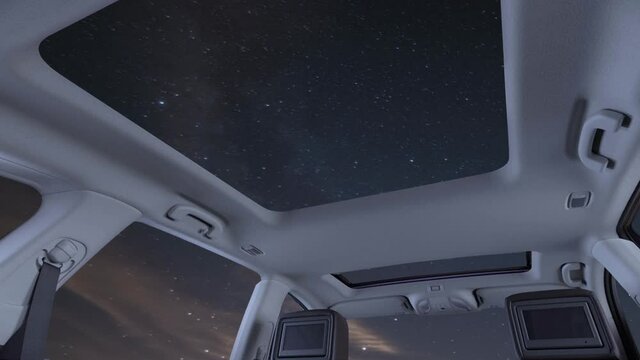 Relaxing Inside A Luxurious Vehicle With A Panoramic Sunroof Open During A Beautiful Evening As Stars And Clouds Cross Paths In The Sky.