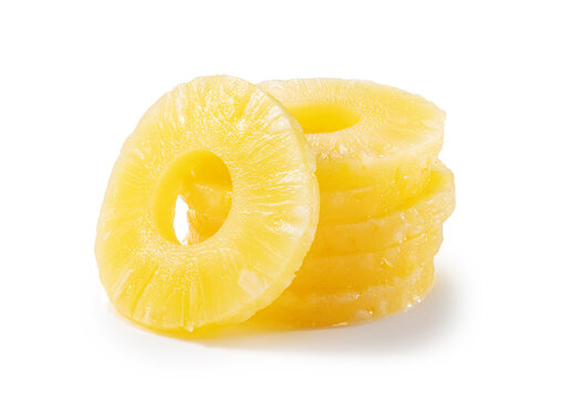 Pineapple slices placed on a white background