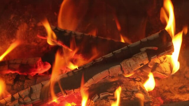 Burning fire, firewood coal closeup