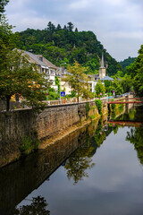 Luxembourg city, Luxembourg - July 15, 2019: A beautiful riverside street in old tow of Luxembourg city - 422225473
