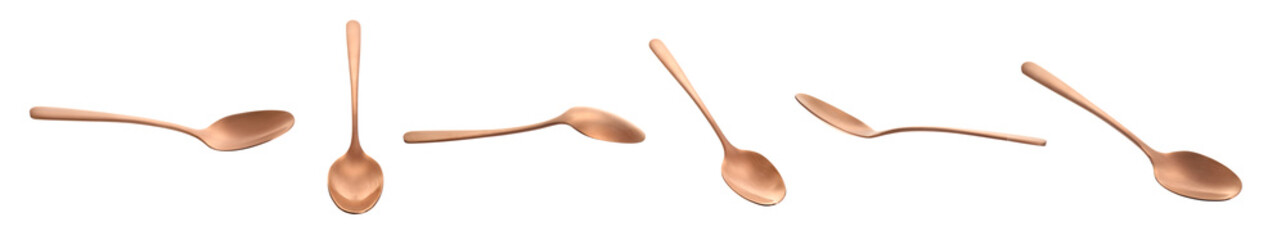 Flying spoons on white background