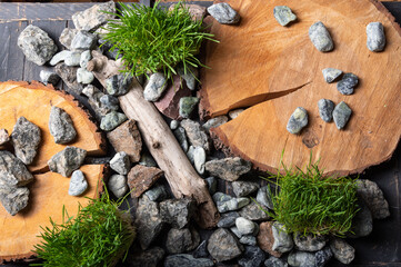 Background from natural stones, wood and grass. Natural natural background and texture.