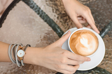 Fototapeta premium Woman with stylish wrist watch in cafe