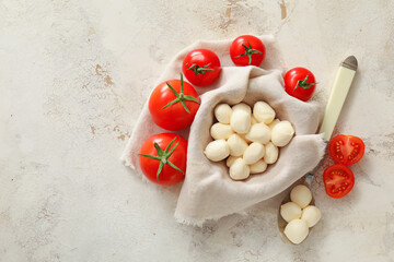 Composition with mozzarella cheese on grunge background