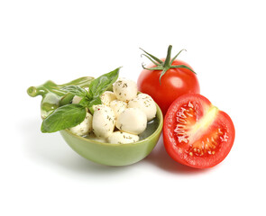 Bowl with mozzarella cheese on white background