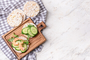 Composition with rice crackers on light background