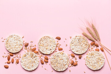 Composition with rice crackers on color background