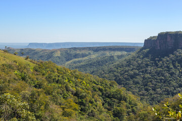 Landscape with green hills and blue sky in the Chapada dos Guimaraes Nationalpark in Mato Grosso, Brazil