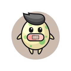 Cartoon illustration of spotted egg with tape on mouth