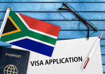 Visa application form and flag of South Africa