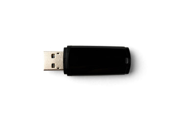 Black USB flash isolated on white background.