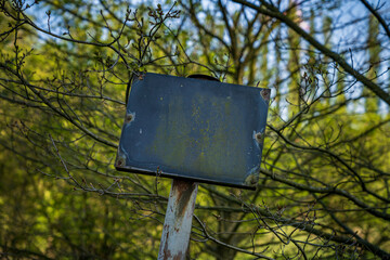 An empty signboard in a park in Bottrop, North Rhine-Westphalia, Germany