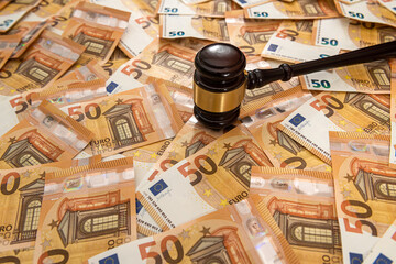 hammer and many 50 euro bills