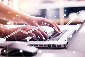 Human hands with smartphone working on laptop on office desk
