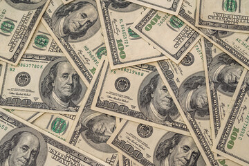 Background of heap of dollars. Paper banknotes concept.