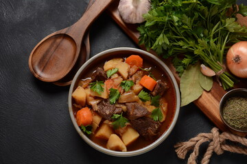 Irish stew made with beef, potatoes, carrots and herbs. Traditional St.Patrick's day dish, stewed...