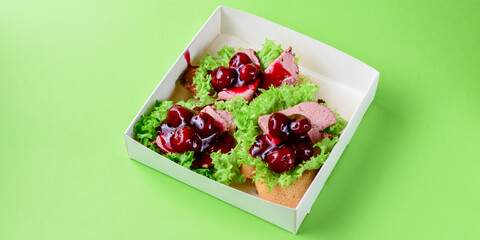 Italian Appetizer Bruschetta in white delivery box, take away concept.