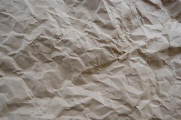 Top view photo of Crumpled craft paper. Paper background with copyspace. Vintage paper canvas texture abstract background.